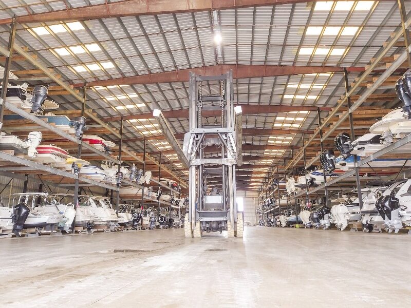 Boats are stacked inside the Marina Bay Horage indoor boat storage facility.